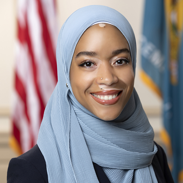 Official portrait of Madinah Wilson-Anton